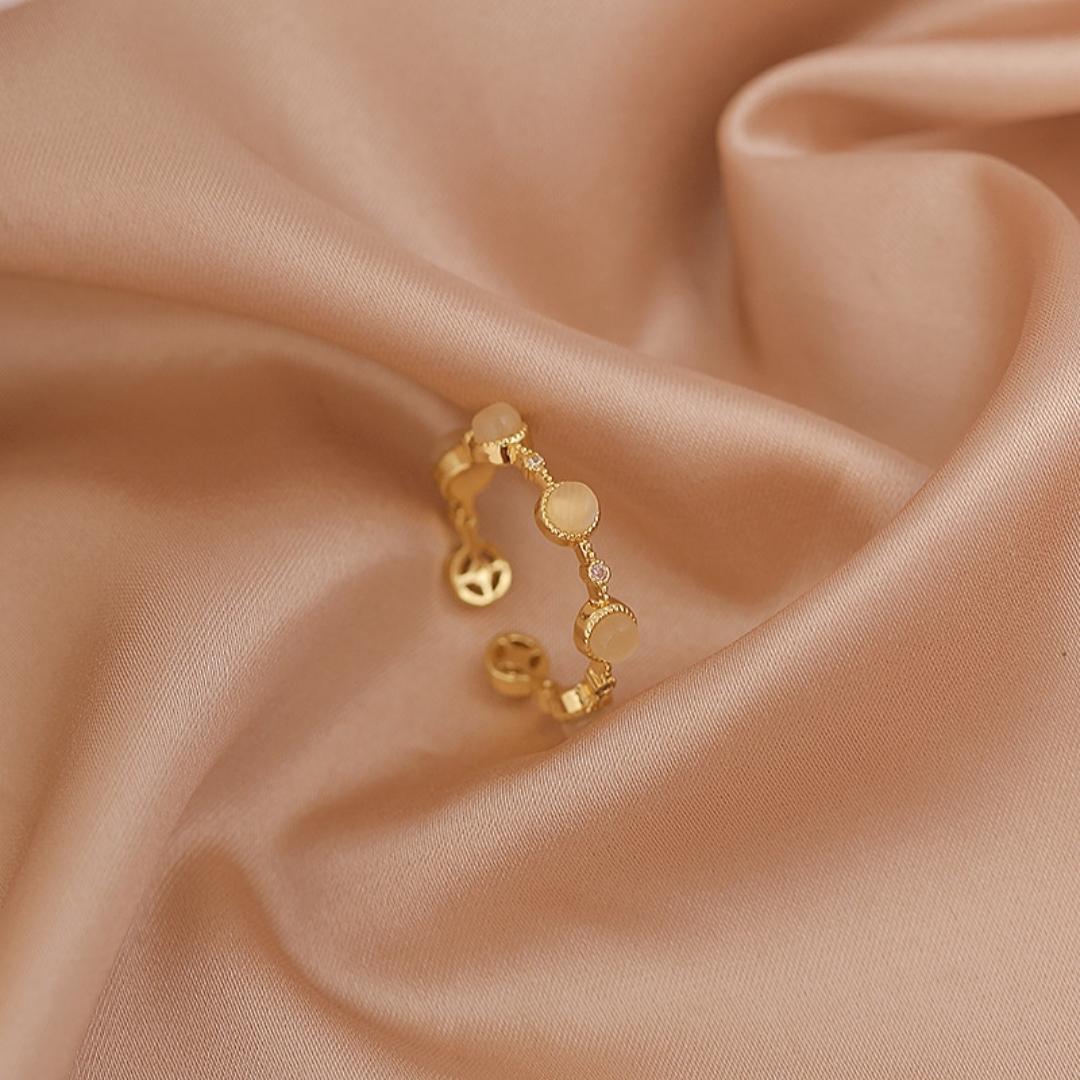 Anneau Oculus réglable avec pierres blanches en or